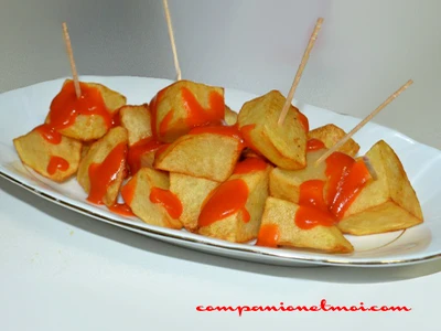 Pommes de terre confites sauce brava