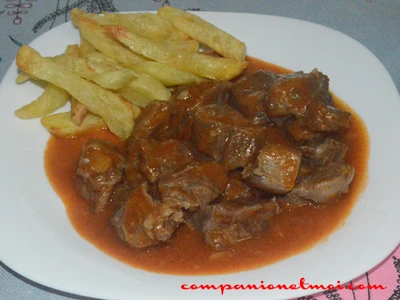 Porc à la sauce tomate