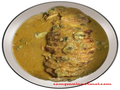 Rôti de poulet en sauce
